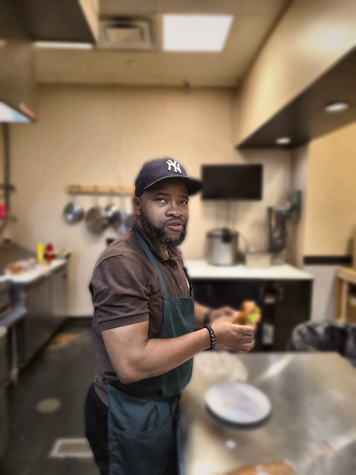 Chef Obinna in the Ufondu Kitchen, moments before the first bite of the Akara Burger.